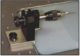 Ram Optical X-1290 Precision 3 jaw chuck mounted in a bushing
